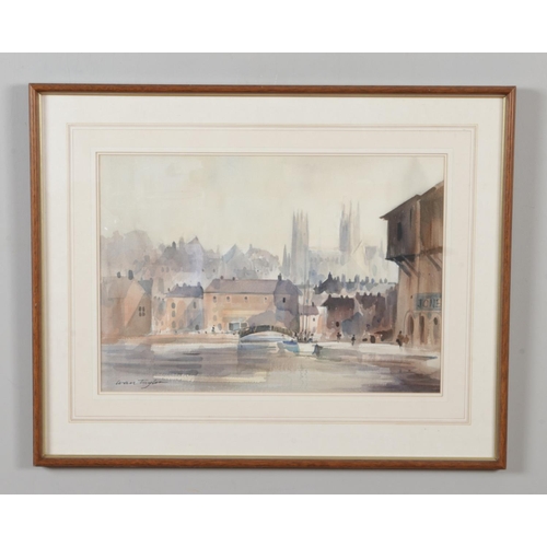 231 - Ivan Taylor (1946-), a framed watercolour, landscape scene depicting Lincoln Cathedral. 33cm x 47cm.