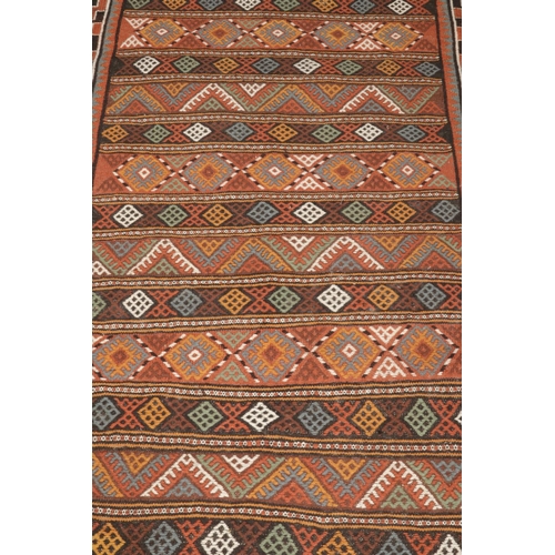 240 - A handmade Iranian wool Kilim with embossed geometric design. 220cm x 125cm.