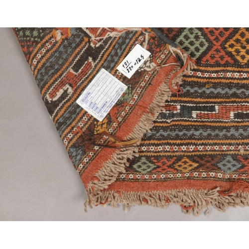 240 - A handmade Iranian wool Kilim with embossed geometric design. 220cm x 125cm.