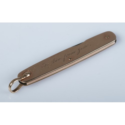 172 - A gold double folding pen knife made in Sheffield. With presentation inscription dated 1908. Length ... 