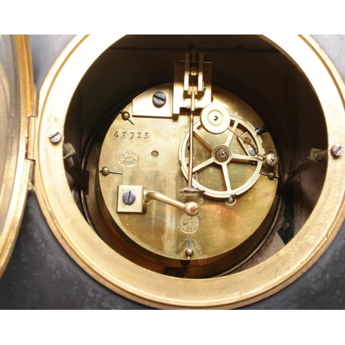 28 - A 19th century black slate and green veined marble mantel clock with visible escapement, stamped 'S.... 