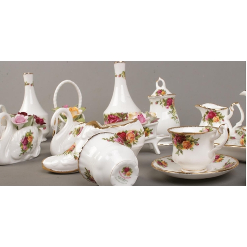 30 - A quantity of Royal Albert Old Country Rose miniatures to include miniature teapot, teacups, saucers... 