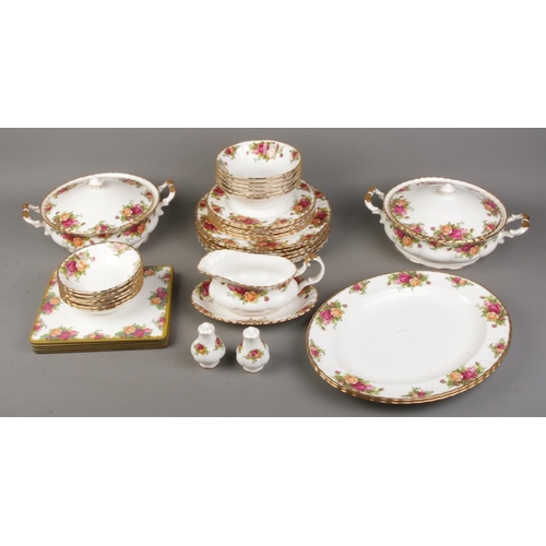 37 - A Royal Albert Old Country Rose dinner set to include tureens, salt and pepper shakers, gravy boat, ... 