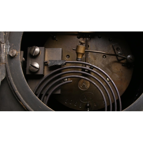 40 - A French 'Japy Freres' black slate three piece garniture mantel clock. The dial with a brass plaque ... 