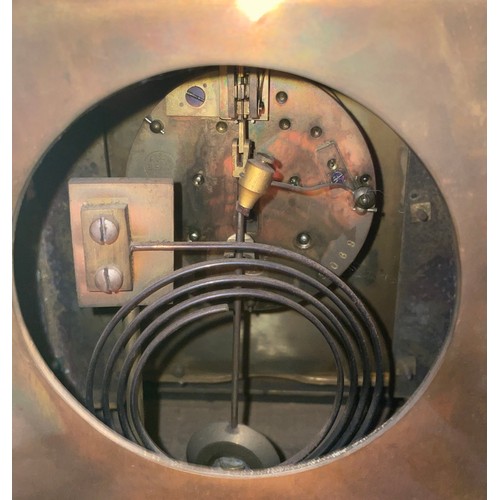 53 - A French brass and porcelain face mantel clock with hand painted porcelain dial signed Morot. On woo... 