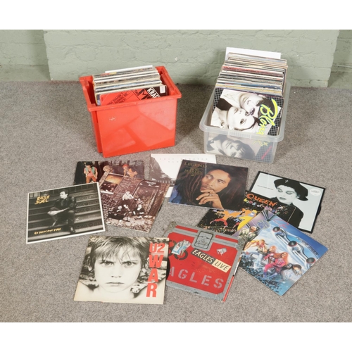 145 - Two boxes of vinyl LP's mainly rock and pop to include The Eagles, Queen, U2, The Who, Jethro Tull, ... 