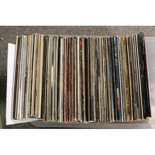 145 - Two boxes of vinyl LP's mainly rock and pop to include The Eagles, Queen, U2, The Who, Jethro Tull, ... 