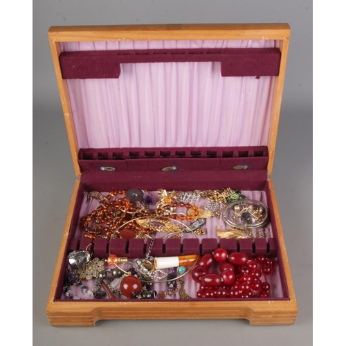 89 - A box of costume jewellery including a small amount of silver, amethyst pendants, beaded necklaces e... 