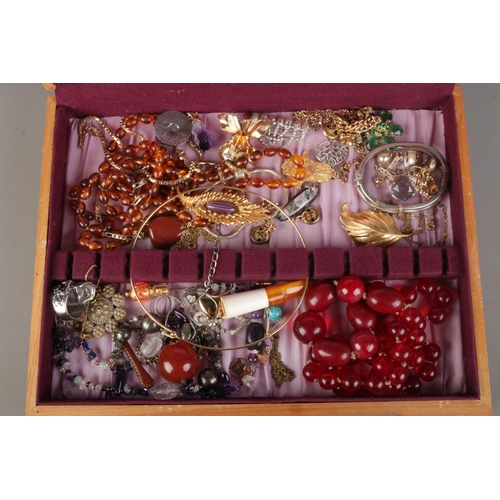 89 - A box of costume jewellery including a small amount of silver, amethyst pendants, beaded necklaces e... 