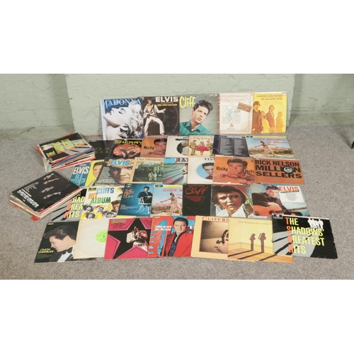 174 - A collection of assorted vinyl LP records to include 1960's and Rock N' Roll examples. Artists inclu... 