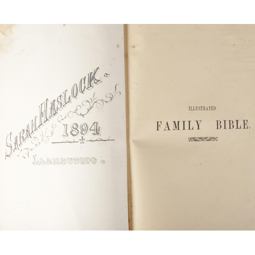 57 - A Victorian Holy Bible containing the Old and New Testaments featuring gilt page edges, published by... 