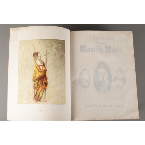 57 - A Victorian Holy Bible containing the Old and New Testaments featuring gilt page edges, published by... 