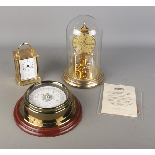 81 - A Mappin and Webb quartz carriage clock along with boxed Kundo 400 day anniversary clock and an aner... 