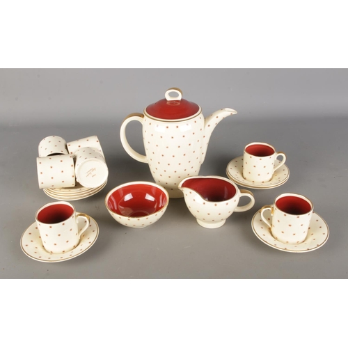109 - A Susie Cooper Starburst pattern coffee set.