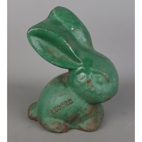 87 - A rare cast iron green painted 'Record' model of a rabbit. H18cm.