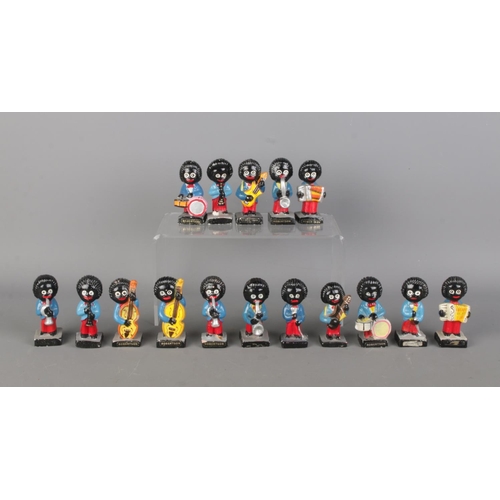 91 - Sixteen 'Robertson' golly band figures; playing variety of instruments.