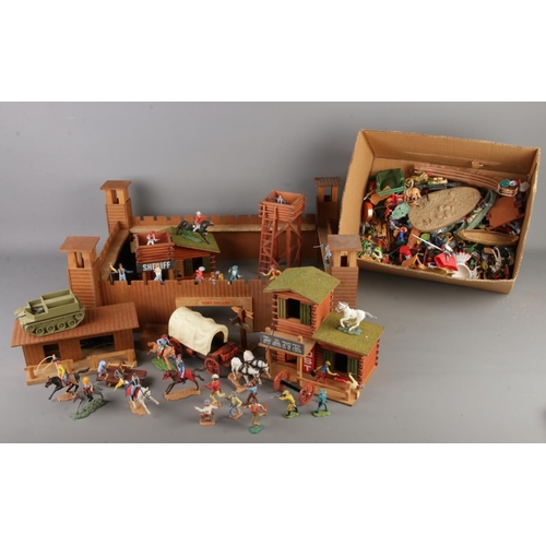 A quantity of assorted Timpo Toys and other examples alongside wooden ...