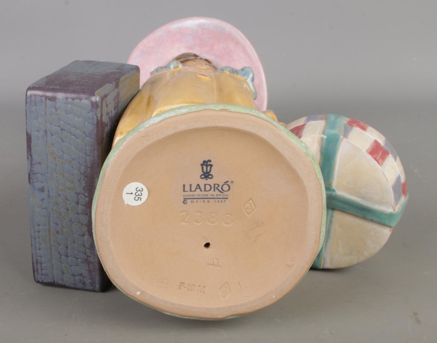 A Lladro ceramic hand painted figure 'Ready To Go'. Number 2388. Approx ...