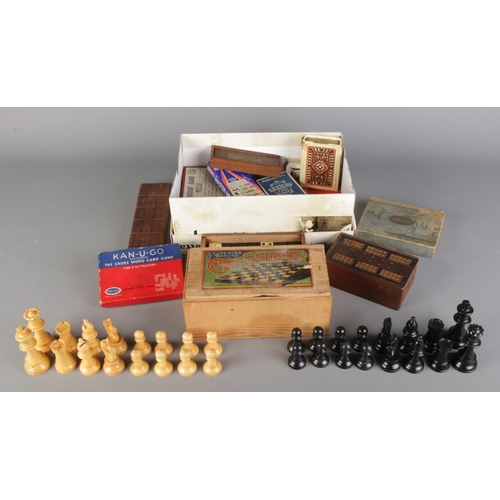 A boxed vintage 'Superior Quality Chessmen' set complete alongside a ...