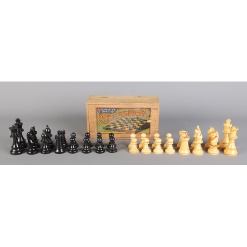 A boxed vintage 'Superior Quality Chessmen' set complete alongside a ...