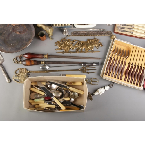A good collection of metalware; Including an assortment of cutlery ...