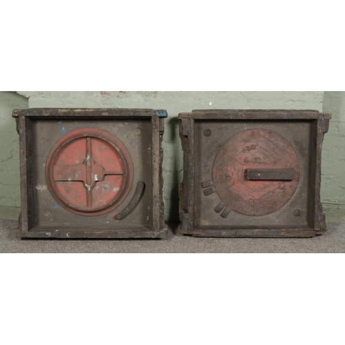 369 - Two wooden framed foundry moulds stamped '3167 CC'. H68cm.