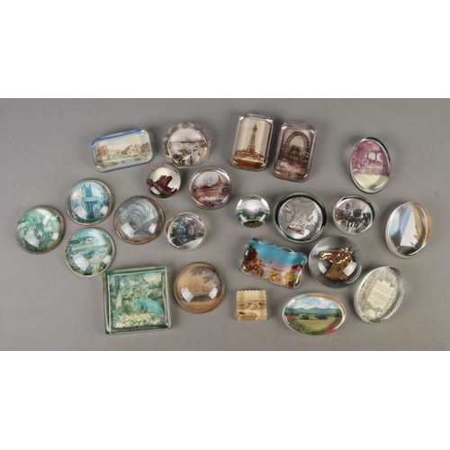 104 - A collection of twenty-three photo back clear glass paperweights; including vintage, antique and mod... 