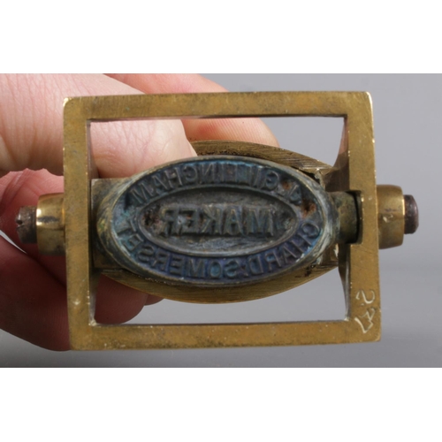 21 - A late Nineteenth/early Twentieth century brass inkpad/desk stamp, for 'Maker J. Gillingham, Chard, ... 