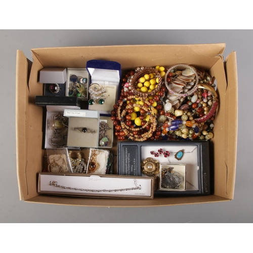 26 - A box of mainly costume jewellery, together with a small quantity of silver examples. To include coa... 