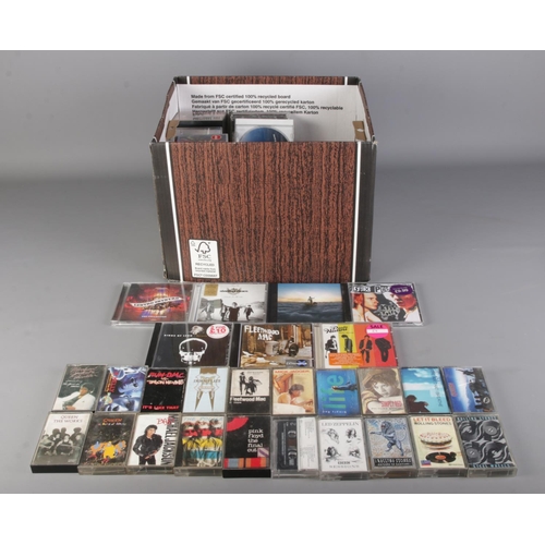 199 - A box of mixed cassette tapes and CD's inlcuding Pink Floyd, Led Zeppelin, Simply Red, Queen, Michae... 