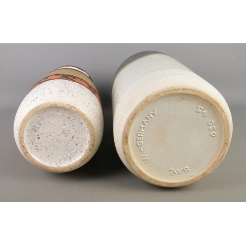 372 - Two large West German Pottery vases to include example featuring bands in the lava design. Approx. h... 