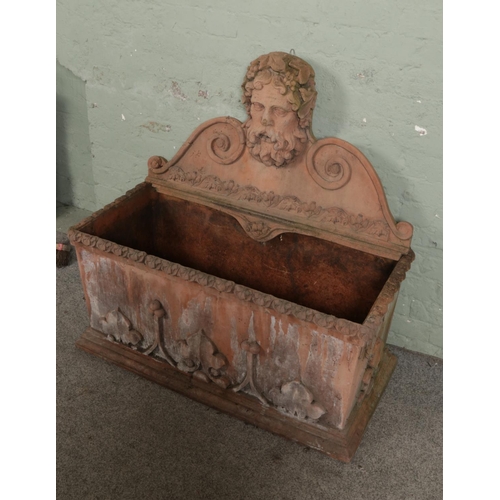 379 - A substantial terracotta planter/water feature surmounted with head of Bacchus 

Hx111cm
Wx113cm
Dx5... 