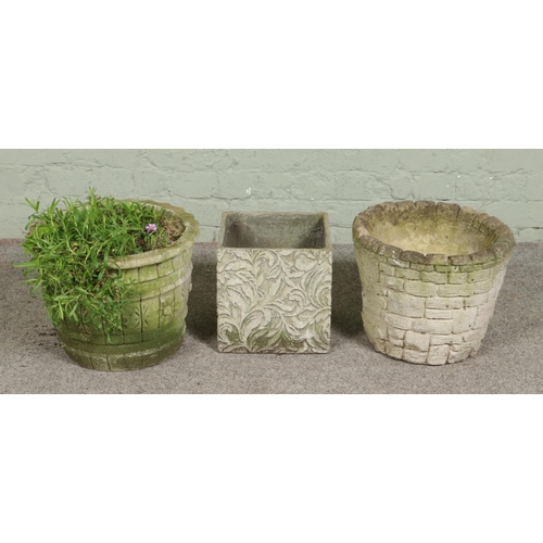 382 - Three garden planters including one of square form with foliate design