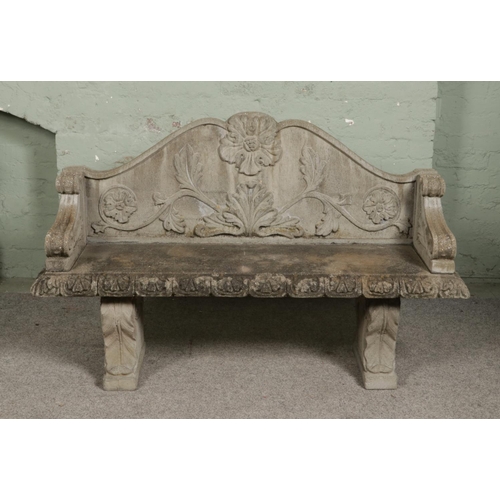 383 - A large 20th century composite stone garden bench. Height 94cm, Width 146cm, Depth 48cm.