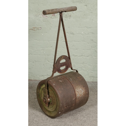 386 - A vintage garden roller 

Hx96cm