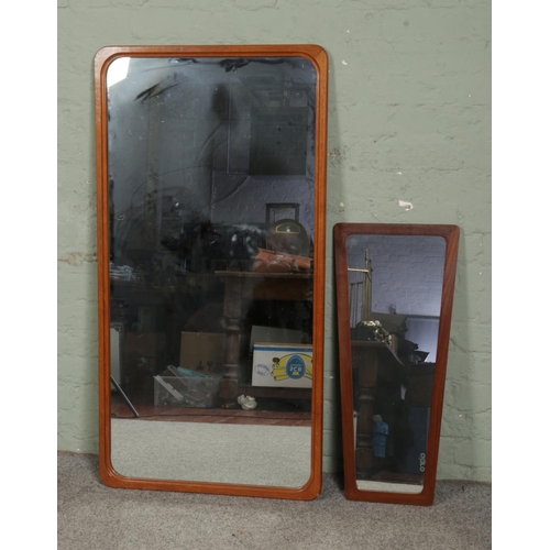 421 - A large Danish teak framed wall mirror along with a smaller asymmetrical example. Approx. dimensions... 