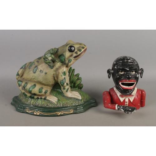57 - A cast iron door stop formed as a frog, together with a novelty money box bearing Starkie's Patent 3... 