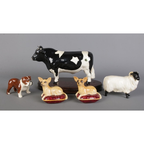 7 - A quantity of Beswick porcelain animal figures; A Beswick Champion Friesian bull, a Beswick Bosun Bu... 