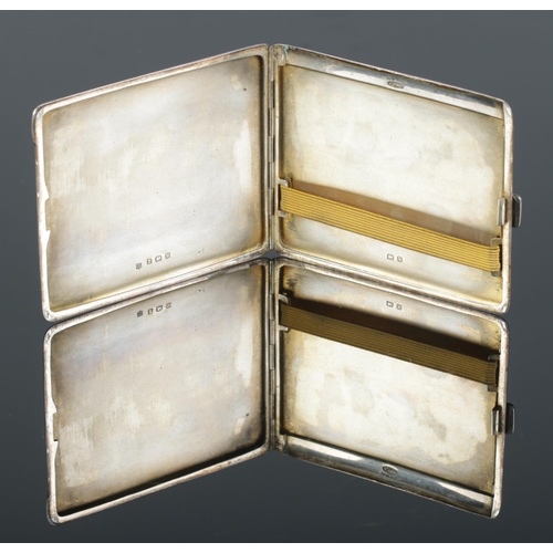 464 - A George VI silver cigarette case, with engine turned detailing. Assayed for Birmingham, 1945, by Ch... 