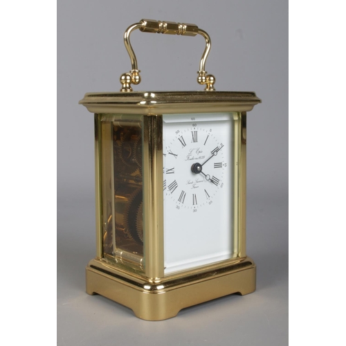 3 - A Twentieth Century French L'Epee brass carriage clock, with visible escapement and 11 jewel movemen... 
