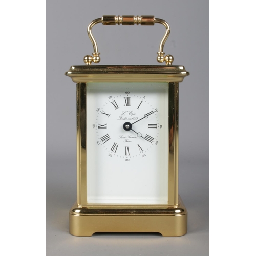 3 - A Twentieth Century French L'Epee brass carriage clock, with visible escapement and 11 jewel movemen... 
