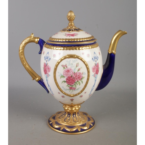 493 - A House of Faberge 'The Faberge Egg Imperial Teapot' gilt decorated with rose motifs and acorn finia... 