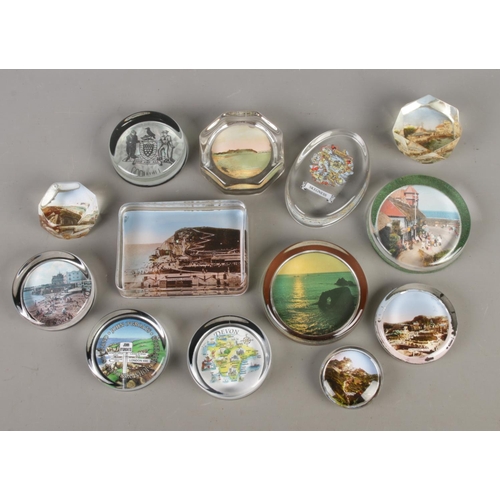99 - Thirteen antique and vintage photo and souvenir back clear glass paperweights of seaside's; Includin... 