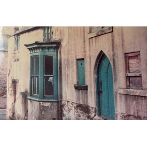 499 - An antique pine Gothic arched door featuring ironmongery studs and detailing with handles, locks etc... 