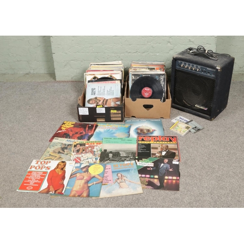 123 - Two boxes of assorted vinyl LP records of mainly pop and easy listening to include Jean Michael Jarr... 