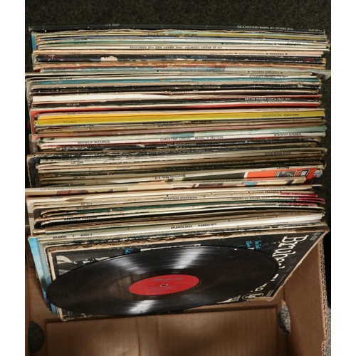 123 - Two boxes of assorted vinyl LP records of mainly pop and easy listening to include Jean Michael Jarr... 