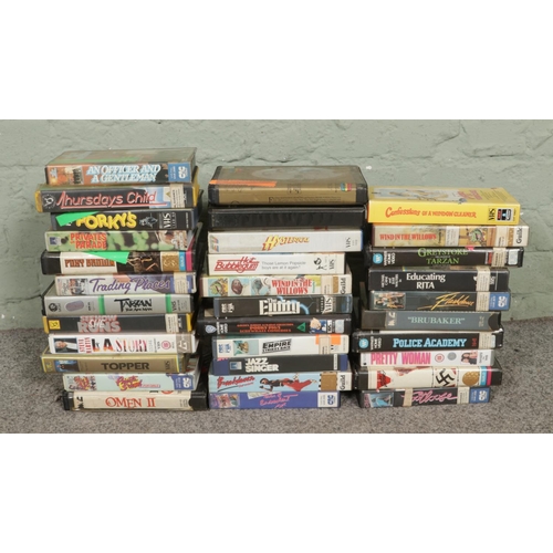 129 - A good collection of assorted VHS tapes in varying genres to include Star Wars: The Empire Strikes B... 