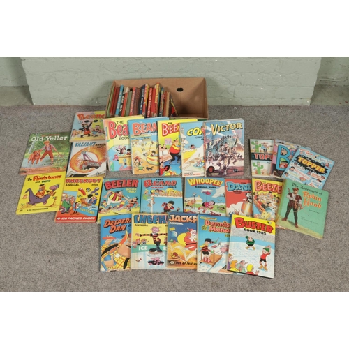 131 - A collection of assorted vintage books; The Beano Books, The Topper Books, Huckleberry Hound, The Vi... 