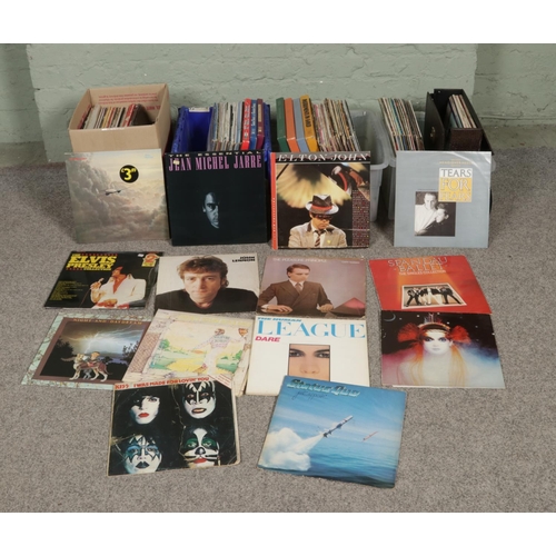 150 - Four boxes of assorted vinyl LP records of mainly pop and easy listening to include Status Quo, Kiss... 