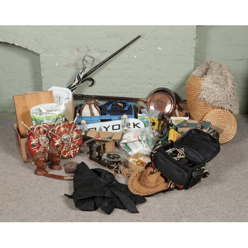 155 - Five boxes of miscellaneous items to include bowling balls, bed pan, rugs including sheep skin examp... 